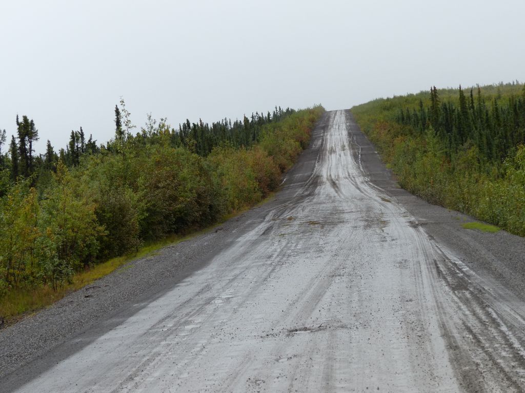 The past two days' rain turned the road into a slow slog through soupy mud.