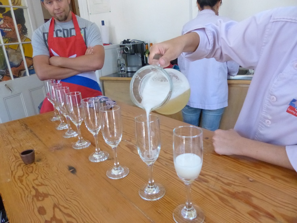We of course had plenty of wine to acompany our meal, and here we're pouring the pisco sours.